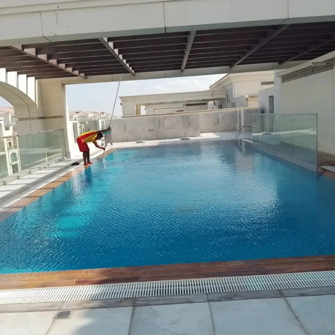 Family enjoying a backyard pool